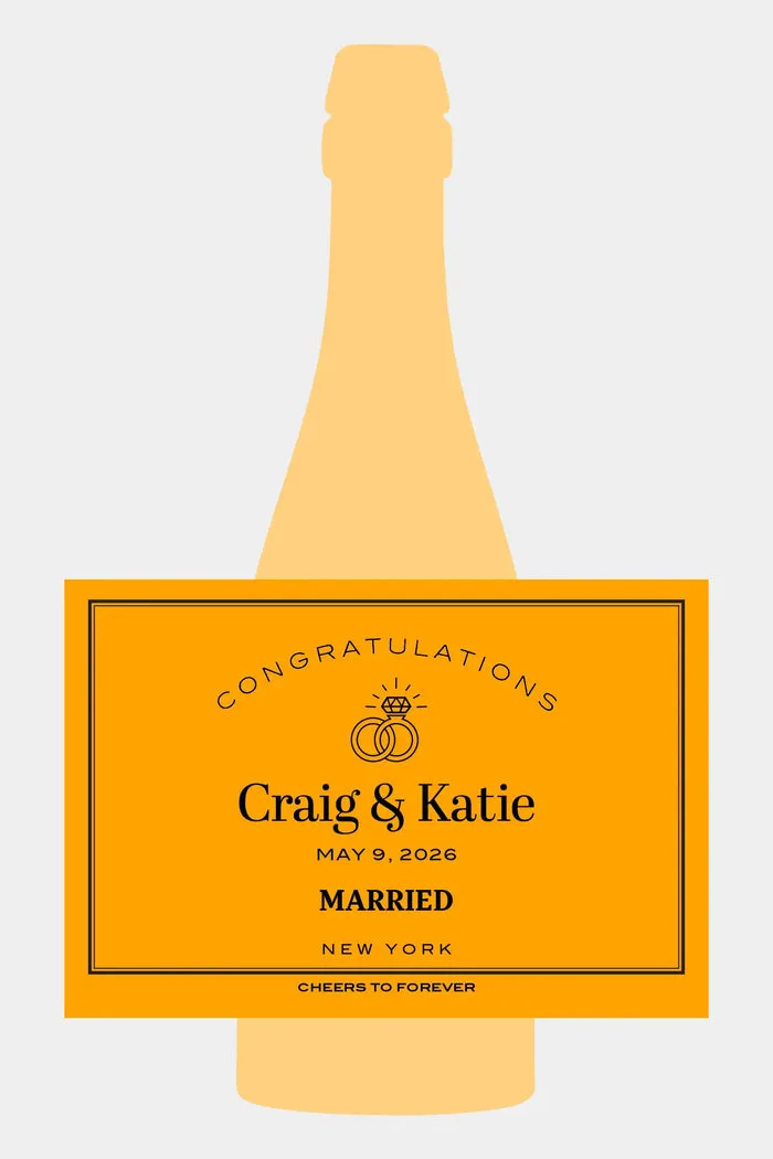 Personalized champagne bottle label with the couple’s names